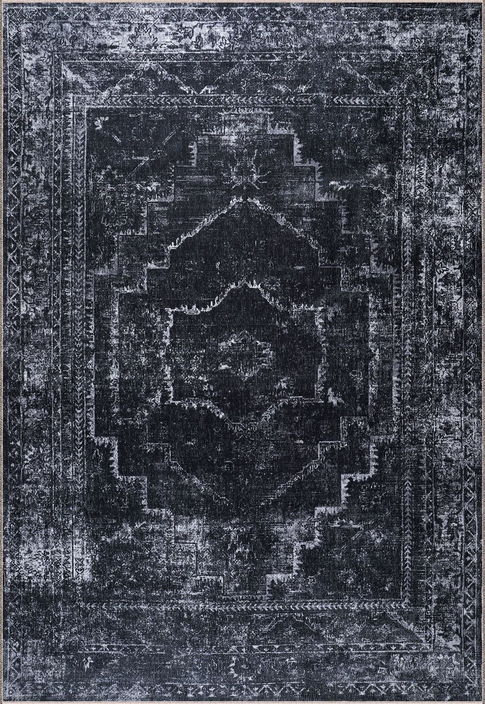 Machine washable black distressed rug with vintage medallion design by Netline Home, ideal for living rooms, bedrooms, or offices.