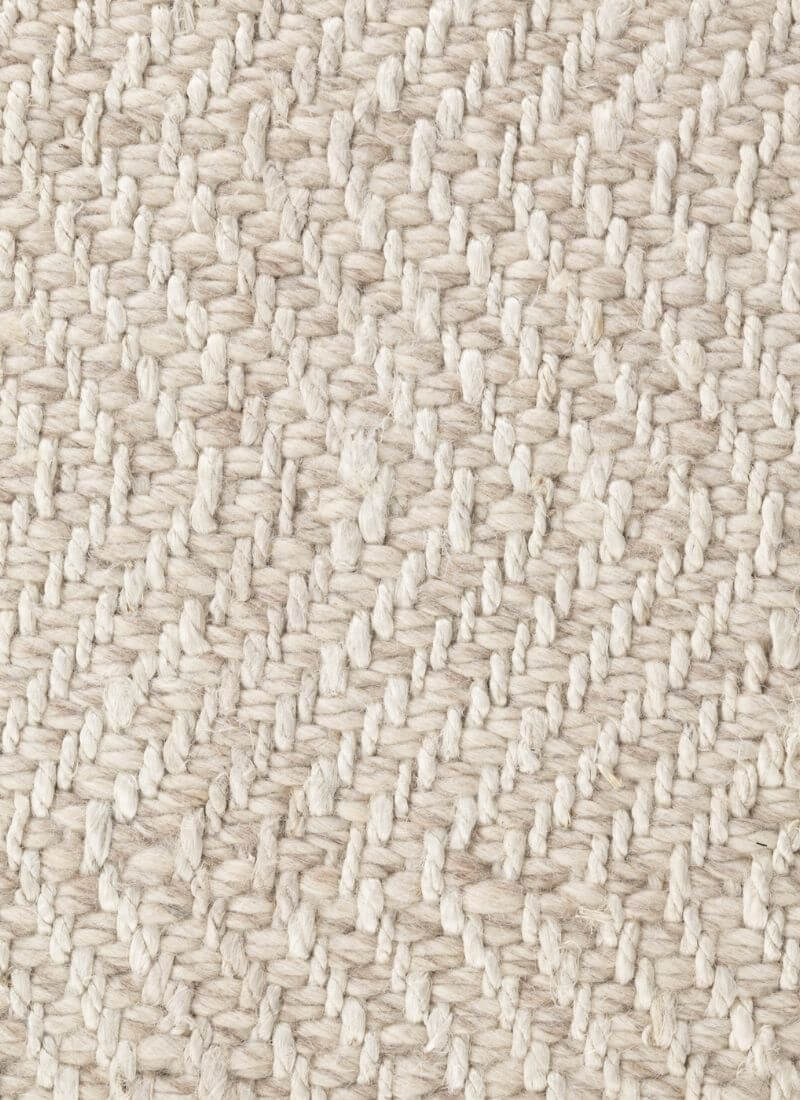 Natural white herringbone wool and jute runner rug by The Rugs, showcasing its textured pattern and soft, durable fibers.