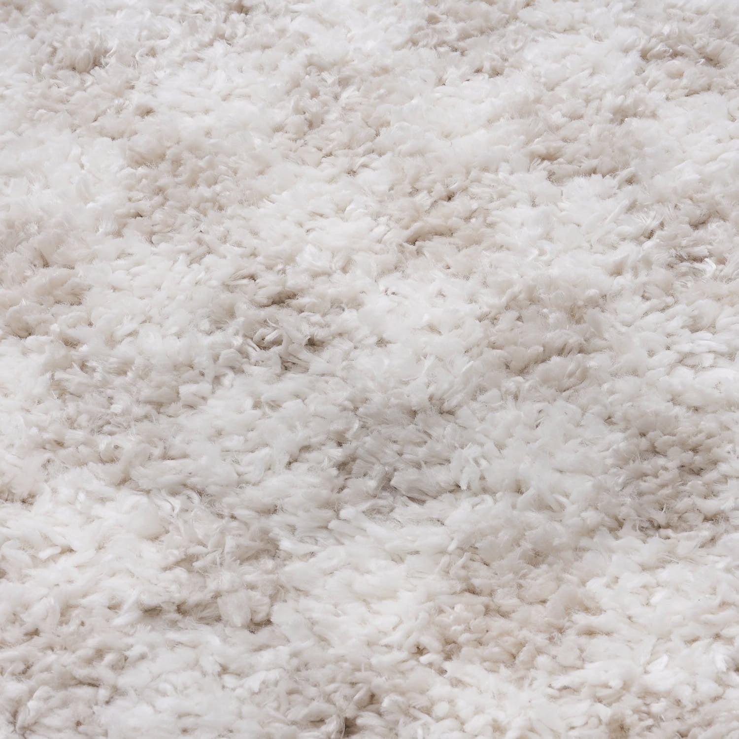 Light beige Moodi Nomari shaggy runner rug by The Rugs, featuring a soft, textured surface and contemporary design.