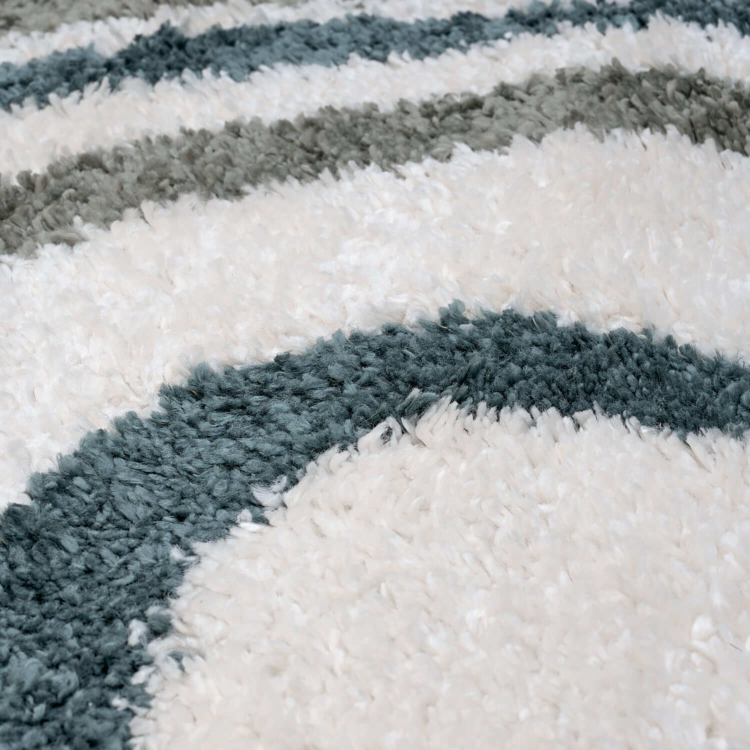 Moodi Shaggy Green Rippletide Rug