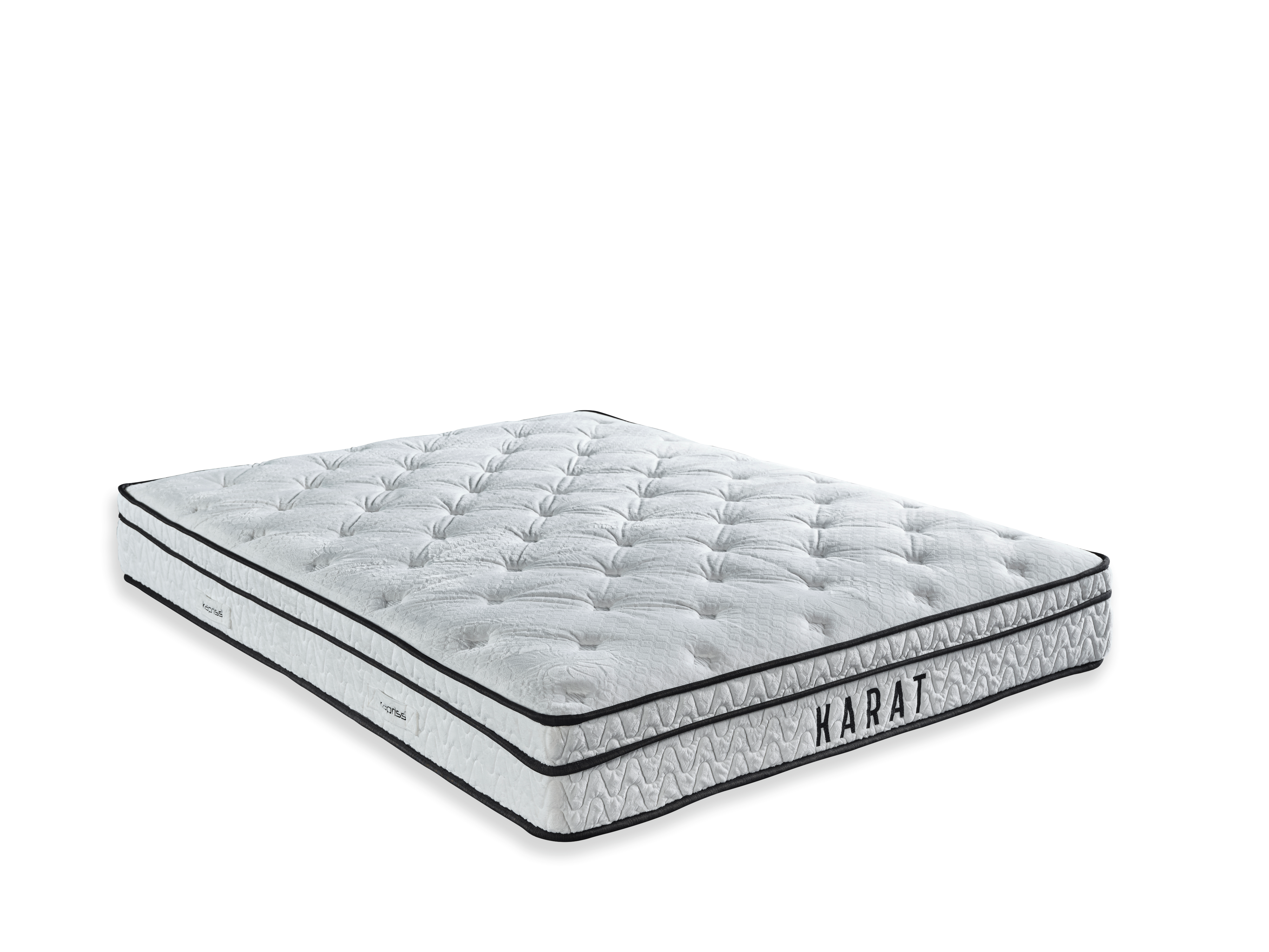 Karat Mattress by Netline Home Interior, showing a supportive, plush mattress with a quilted top and neutral fabric cover.