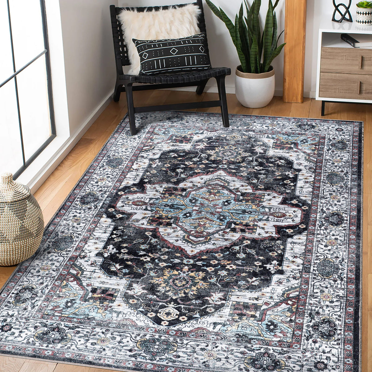 Machine washable Persian medallion rug by Netline Home featuring vintage black, white, and blue accents for living room or bedroom.