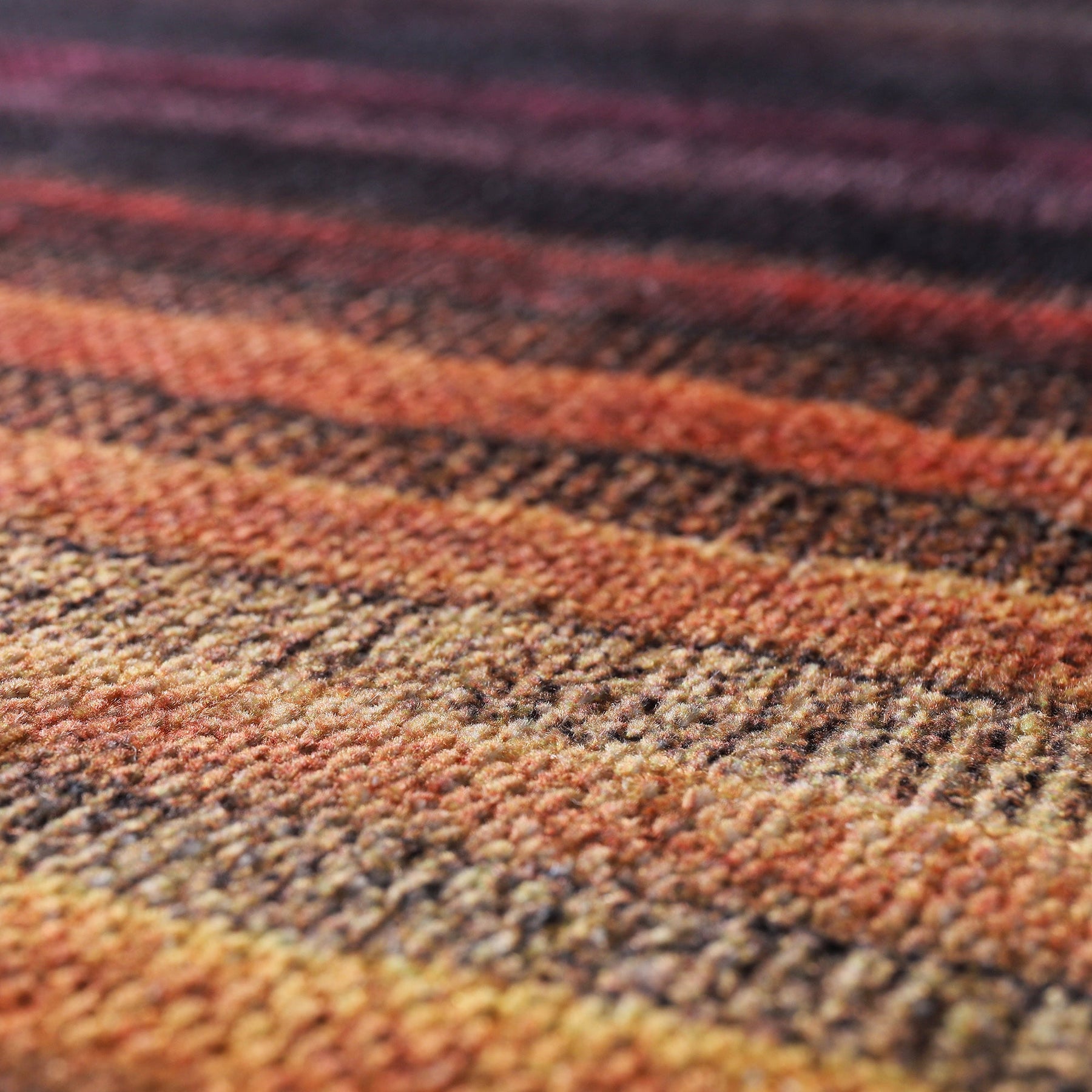 Colorful multicolor striped washable rug by Netline Home, modern bohemian design for living room, bedroom, or office.
