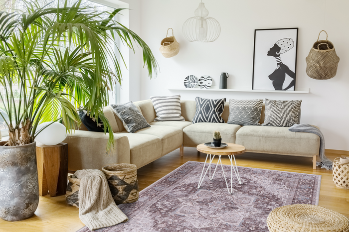 Crisp Patina Deep Purple Vintage Washable Rug shown in an illustrative room