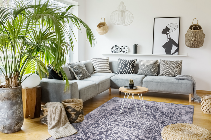 Radiant Stripes Soft Grey Abstract Washable Rug shown in an illustrative room