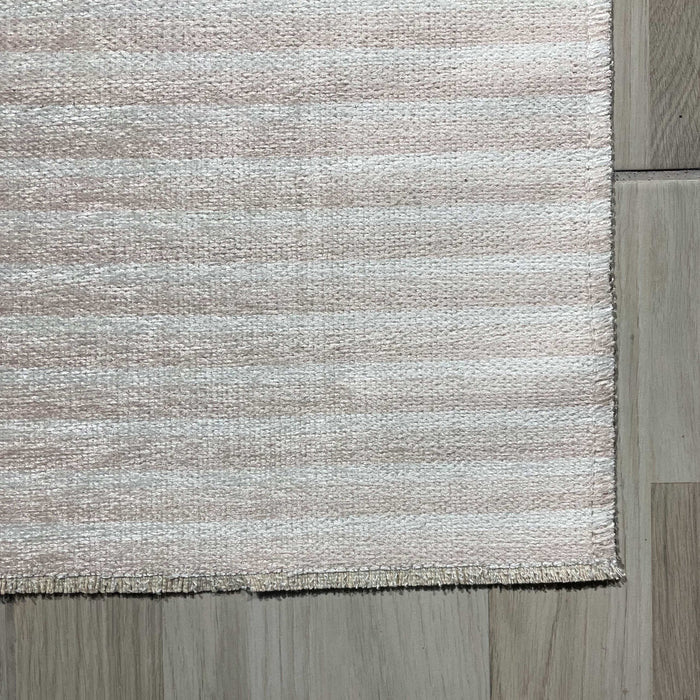 Moonlit Stripes Off White Modern Washable Rug shown in an illustrative room