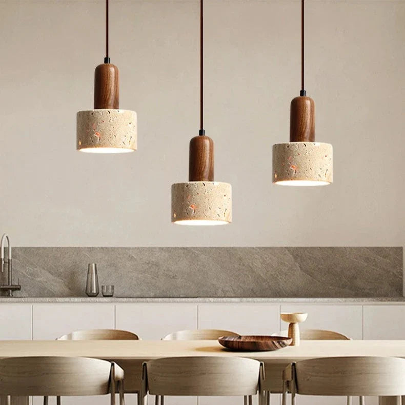 Beige and brown travertine pendant light from Light My House, ceiling-mounted kitchen island lighting fixture with natural stone texture.