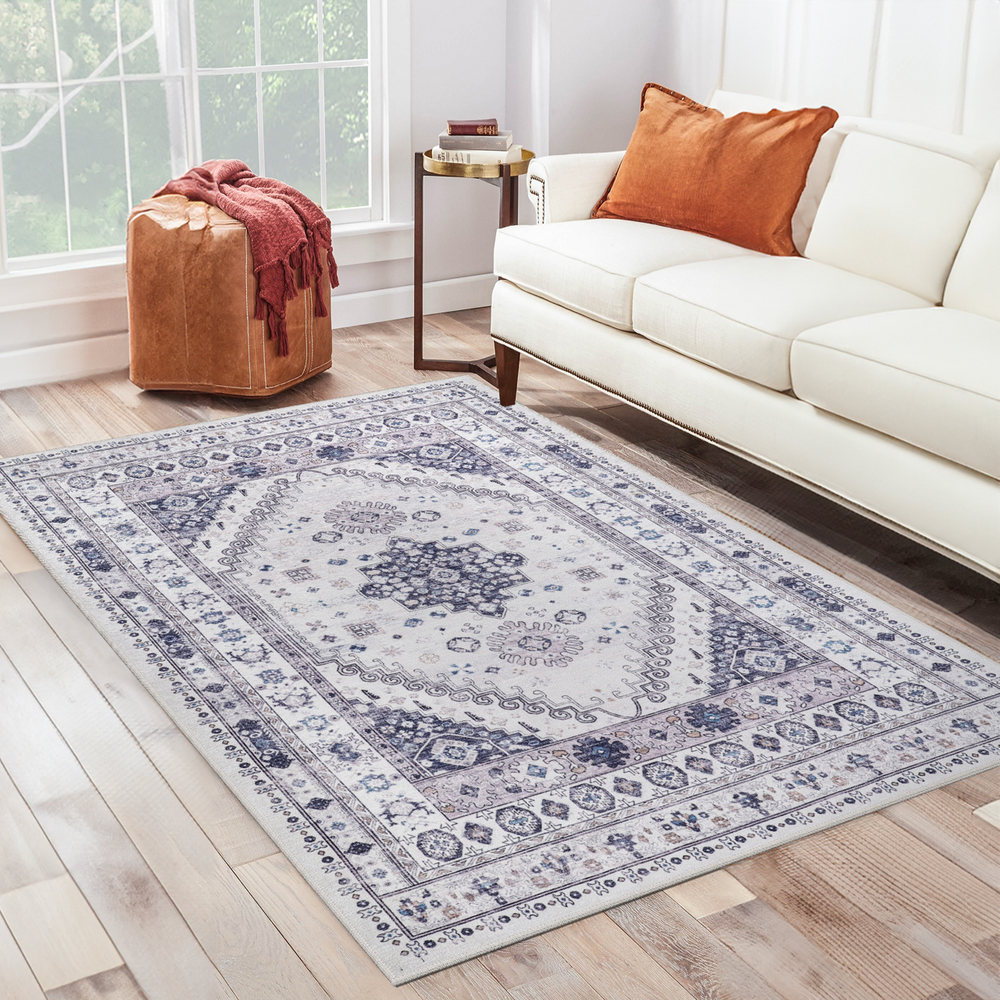 Beige floral washable rug by Netline Home, modern non-slip design, ideal for living rooms, machine washable and durable.