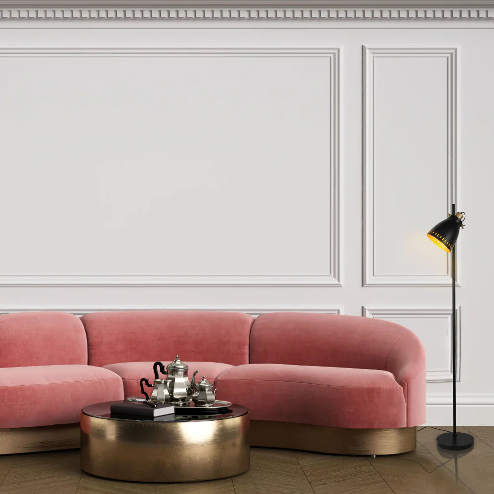 Netline Home Interior cone-shaded floor lamp with gold detailing and decorative shade in versatile colors, standing on a modern floor.