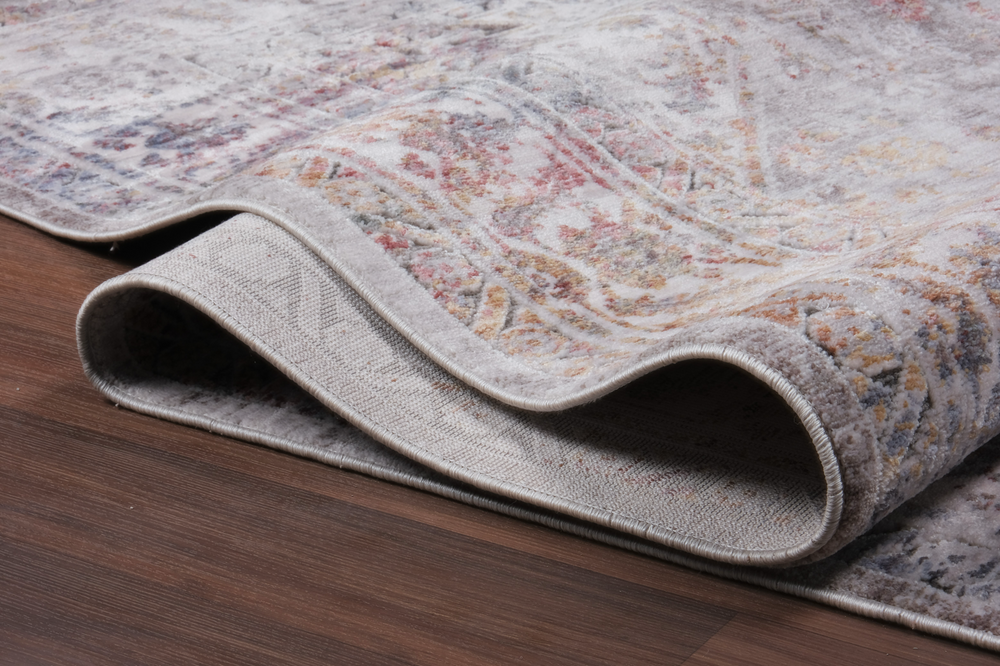 Vintage netline home runner rug with distressed oriental design in soft grey and rust tones, ideal for cozy living spaces.