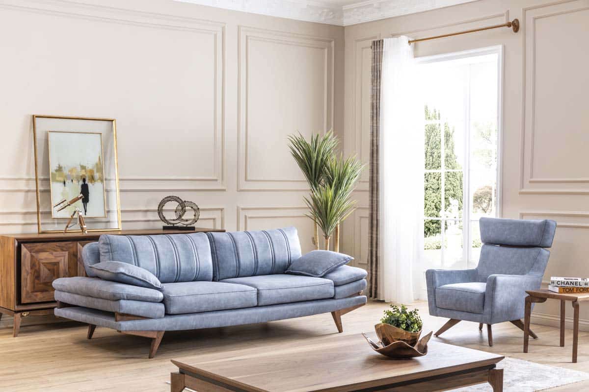Light blue Falcon sofa set by Netline Home Interior, modern living room furniture with plush cushions and sleek design.