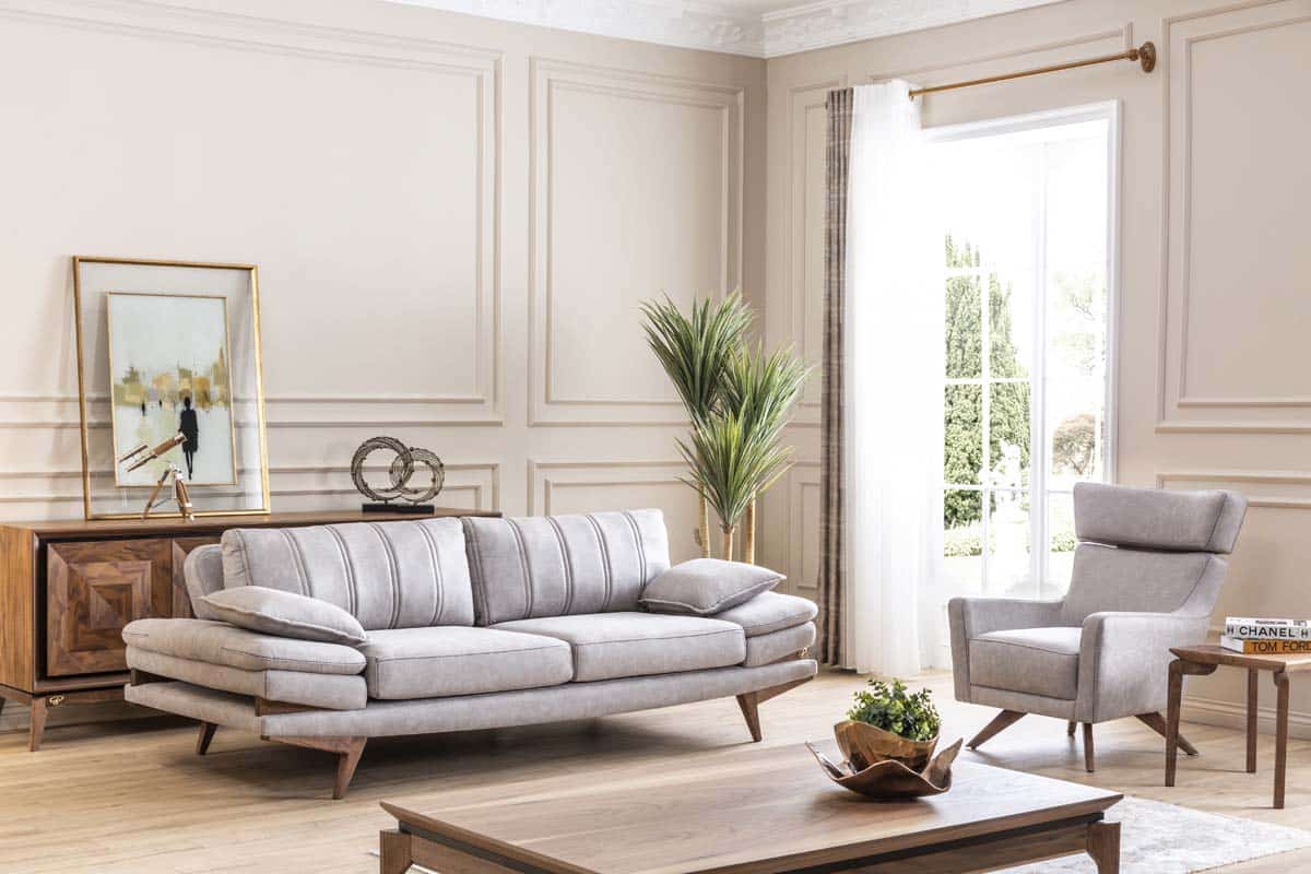 Light grey Falcon sofa set by Netline Home Interior, modern living room comfort with plush cushions and sleek design.