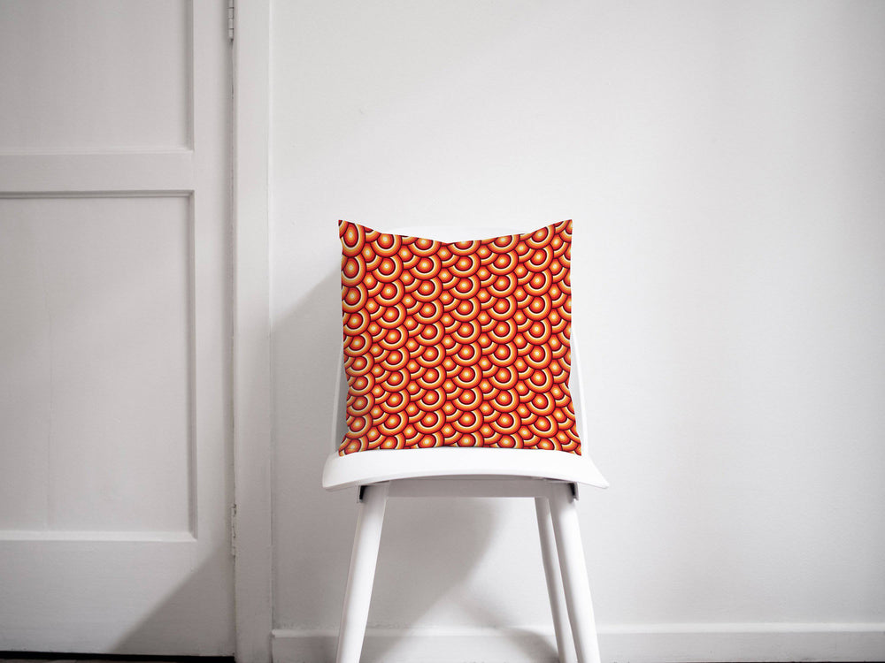 Orange Cushion with a 70's Retro Circles Design