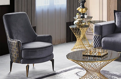 Netline Home Interior Kenzo armchair with plush fabric, modern design, and comfortable seating for stylish accent decor.