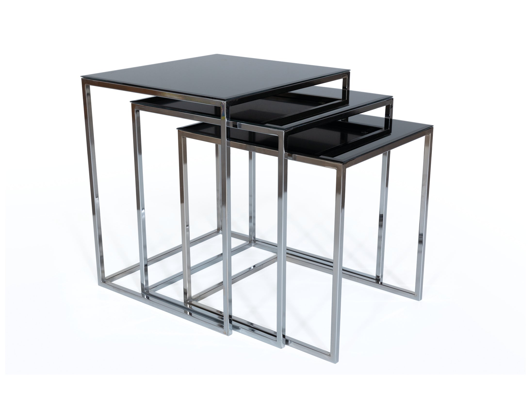 Set of three silver Lexa nesting side tables by Netline Home Interior, stylish coffee tables for modern living room decor.