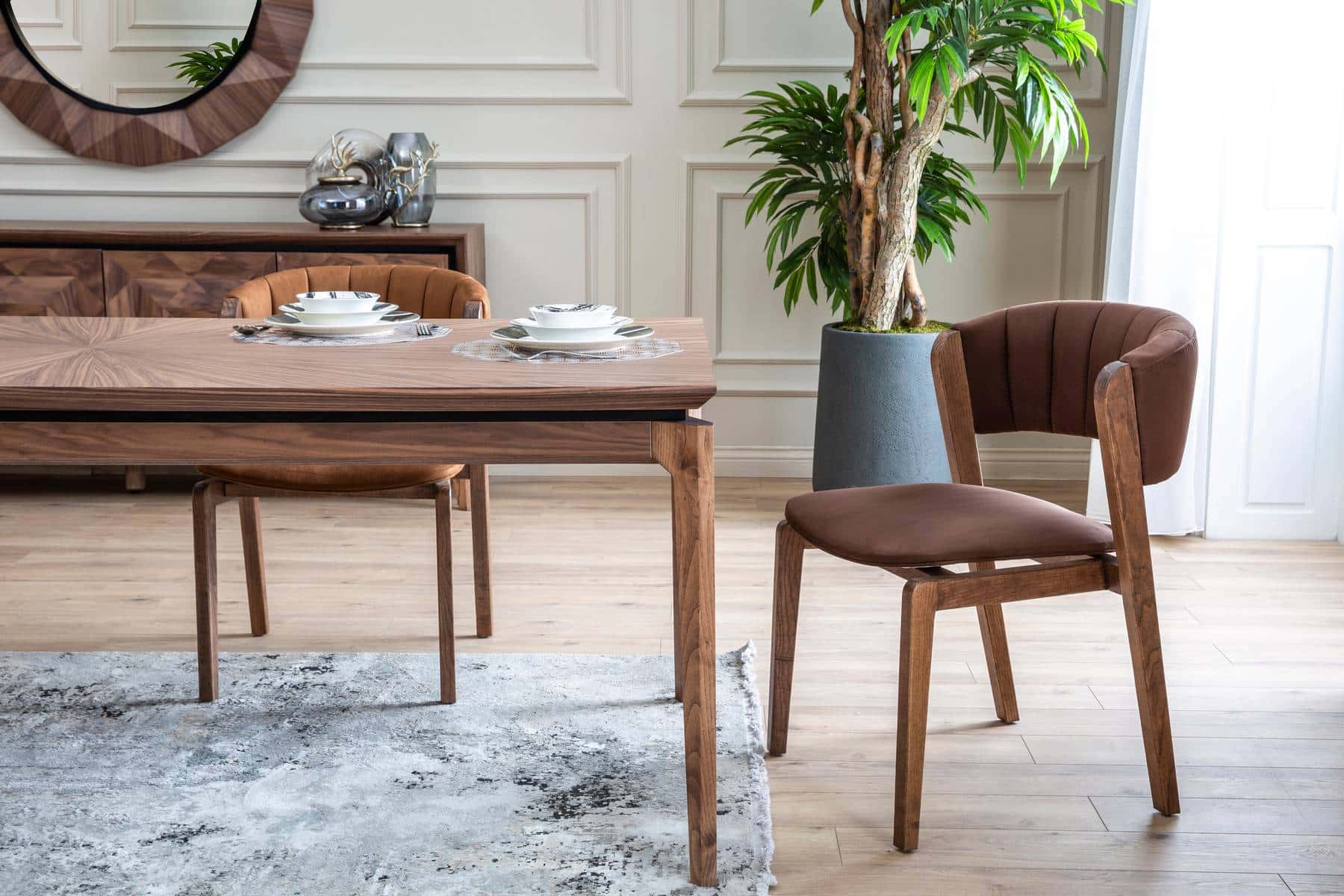 Modern Maserati dining room set by Netline Home Interior with a sleek table and matching chairs, perfect for stylish entertaining.