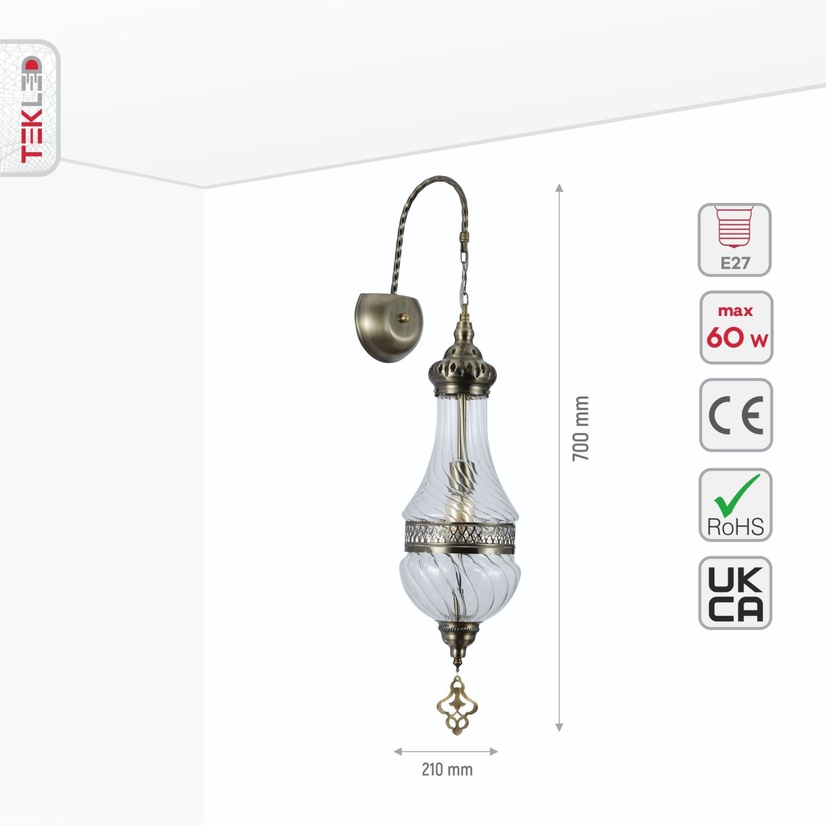Clear glass antique bronze Moroccan style wall light with metal body and E27 fitting, showcasing intricate design details.