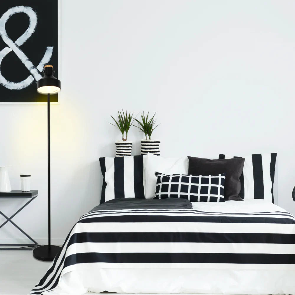 Minimalist adjustable floor lamp with wooden accent from Netline Home Interior, featuring sleek design and modern decorative lighting.