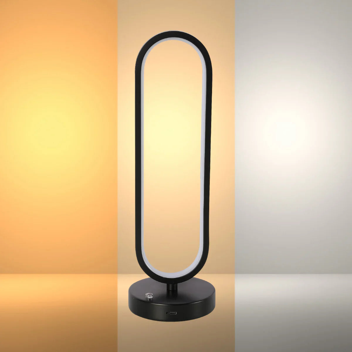 Minimalist oval black table lamp with 3 CCT LED lights, modern design, and sleek finish for stylish home interior lighting.