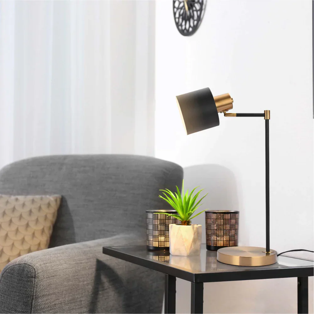 Black and gold Nordic Pole Reading Desk Lamp by Netline Home Interior, stylish table lamp with adjustable arm for indoor lighting.